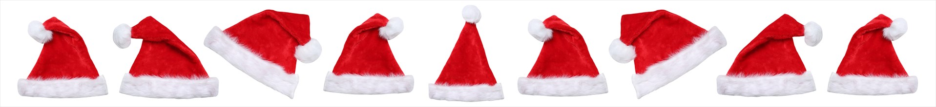 Christmas with Santa hats Santa hats Father Christmas in a row panorama cropped against a white background in Stuttgart