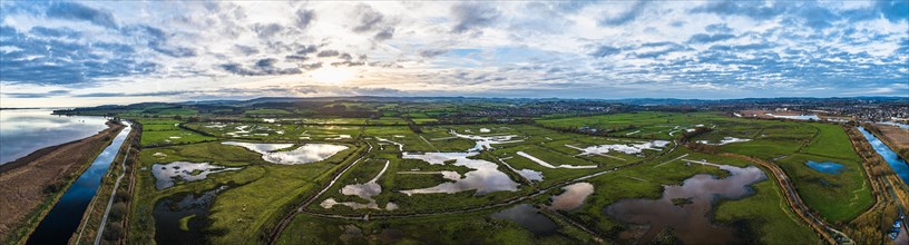 Panorama of Wetlands and Marshes in RSPB Exminster and Powderham Marshe from a drone
