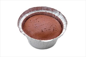 High angle view of chocolate brownie in a baking foil dish isolated on white background