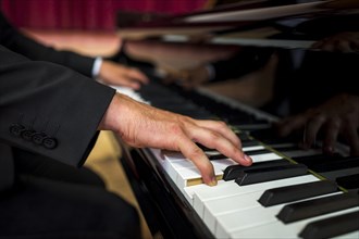 Close up musician playing piano