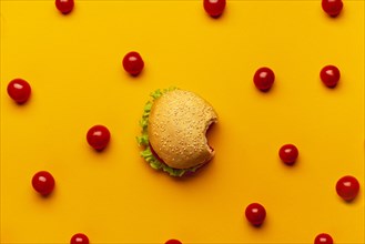Flat lay burger with cherry tomatoes