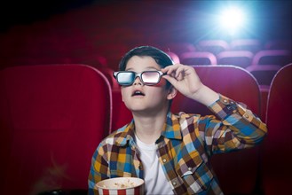 Boy watching movie cinema