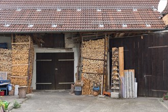 Stacked firewood on a farm