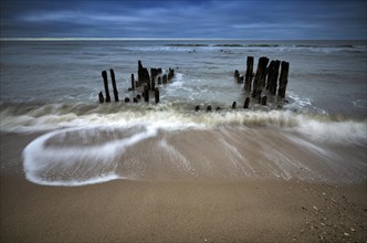 Remains of an old weathered groyne