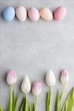 Flat lay colorful easter eggs stunning tulips