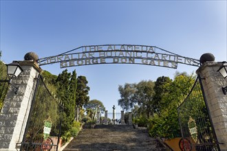 Entrance gate with steps and lettering