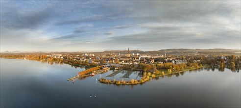 Aerial panorama of the town of Radolfzell on Lake Constance in autumnal vegetation with the Waeschbruckhafen