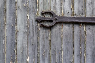 Old wooden door with iron fittings