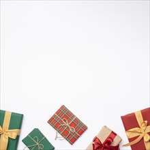 Flat lay christmas gifts white background with copy space
