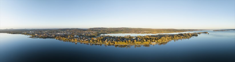Aerial panorama of the Mettnau peninsula in western Lake Constance with autumnal vegetation