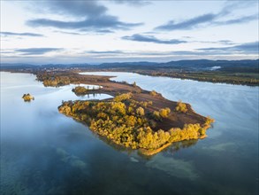 Aerial view of the Mettnau peninsula in western Lake Constance illuminated by the morning sun