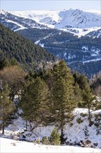 Winter landscape with snow in the snowy mountains of the Pyrenees of Andorra