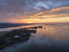 Aerial view of western Lake Constance in front of sunrise with the Mettnau peninsula