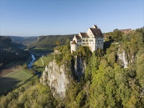 Aerial view of Werenwag Castle on a rocky spur in the upper Danube valley