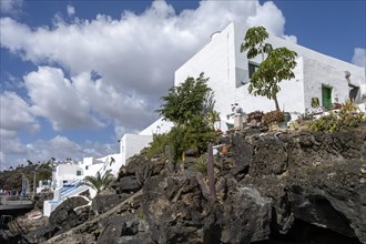 Typical white houses on the promenade of Puerto del Carmen