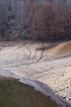 Desolate landscape of drought in the Santa Fe reservoir in the Montseny Biosphere Reserve in the province of Barcelona in Spain