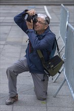 Elderly gentleman photographed on his knees