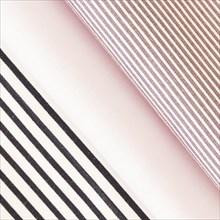 Folded black pink stripes fabric
