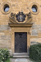 Entrance portal of St Luke's Church with the coat of arms of the von Egloffstein family
