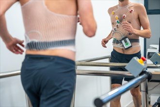 Man running while preforming a cardiovascular stress test in the hospital