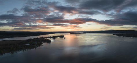 Aerial panorama of western Lake Constance in front of sunrise with the Mettnau peninsula