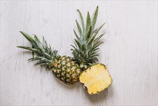 Cut pineapple white table