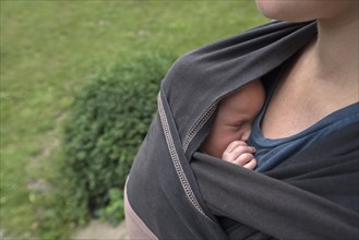 Baby in mother's sling