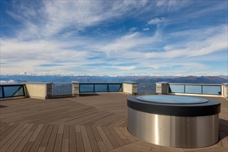 Beautiful Terrace with Viewpoint on Mountainscape and with Snow Capped Monte Rosa in a Sunny Day in Monte Generoso