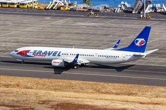 A Boeing 737-900ER Travel Service aircraft with the registration OK-TSI at Funchal Airport