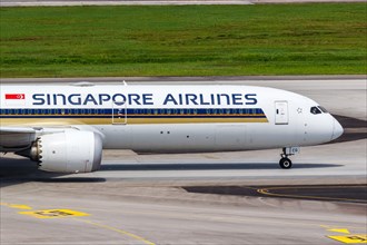 A Boeing 787-10 Dreamliner aircraft of Singapore Airlines with the registration 9V-SCG at Changi Airport