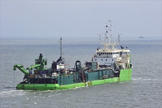 The dredger Jade River on the North Sea