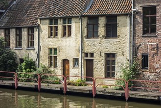 Old medieval houses along the river Lys