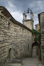 Medieval alley in the village Lacoste