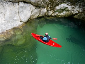 Kayakers on the emerald green Soca River