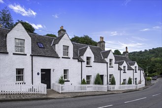 Row of white houses in the village Kenmore