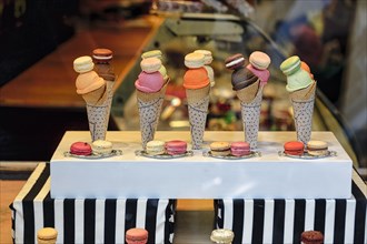 Five ice-cream cones next to each other