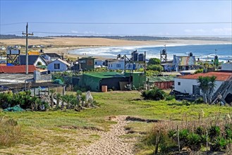 Colourful houses in the hamlet Cabo Polonio along the Atlantic Ocean coast
