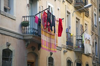 Laundry drying from balcony in the La Barceloneta quarter in Barcelona