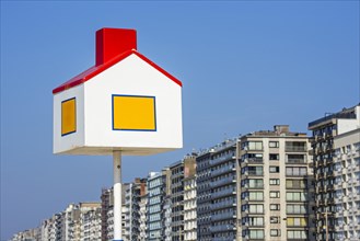 Reference point in the shape of a house for children at the beach and flats