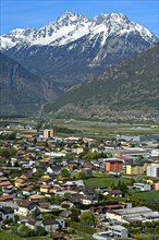 The village of Charrat in the wide Rhone valley in Lower Valais