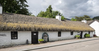 Glencoe & North Lorn Folk Museum in restored longhouse with thatched roof