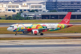 A Thai AirAsia Airbus A320 aircraft with the registration HS-ABR and the Amazing New Chapters special livery at Bangkok Don Mueang Airport
