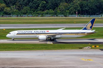 A Boeing 787-10 Dreamliner aircraft of Singapore Airlines with the registration 9V-SCN at Changi Airport