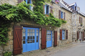 Traditional house decorated with vines at Camaret-sur-Mer
