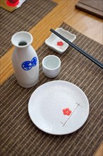 Japanese style table set and sake bottle and cup