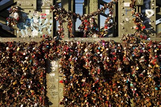 Detail of an extremely large number of love locks as a sign of loyalty on the Hohenzollern Bridge