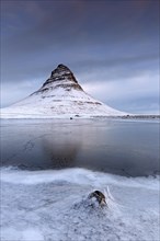 Frozen pond and Kirkjufell