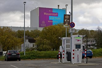 Charging station and large poster for climate steel at the ThyssenKrupp Steel Europe plant