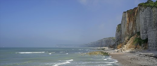 Shingle beach and chalk cliffs along the North Sea coast at Yport