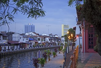 Colonial houses in evening light along the river Melaka in Malacca City